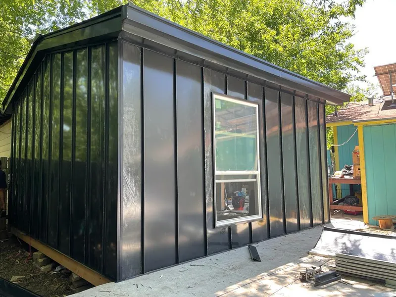 Black standing seam metal wall panels for Metal Roof Installation in Norwood